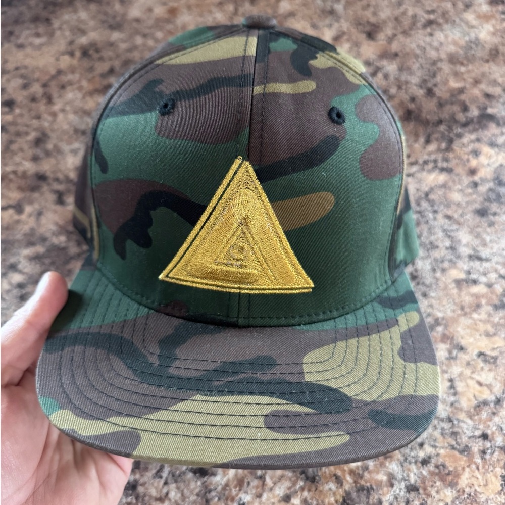 Camouflage Snapback Hat with Yellow Triangle Logo